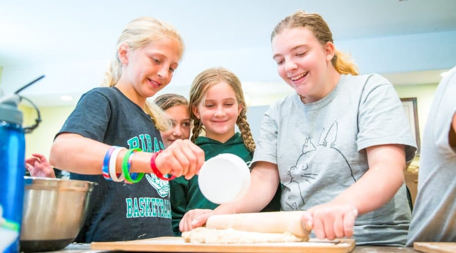 Campers make dough at summer camp